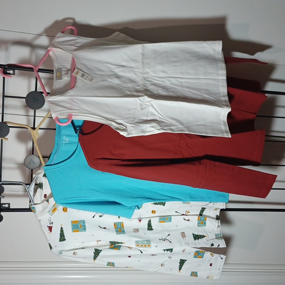 Lot of 4 never worn medium size tops